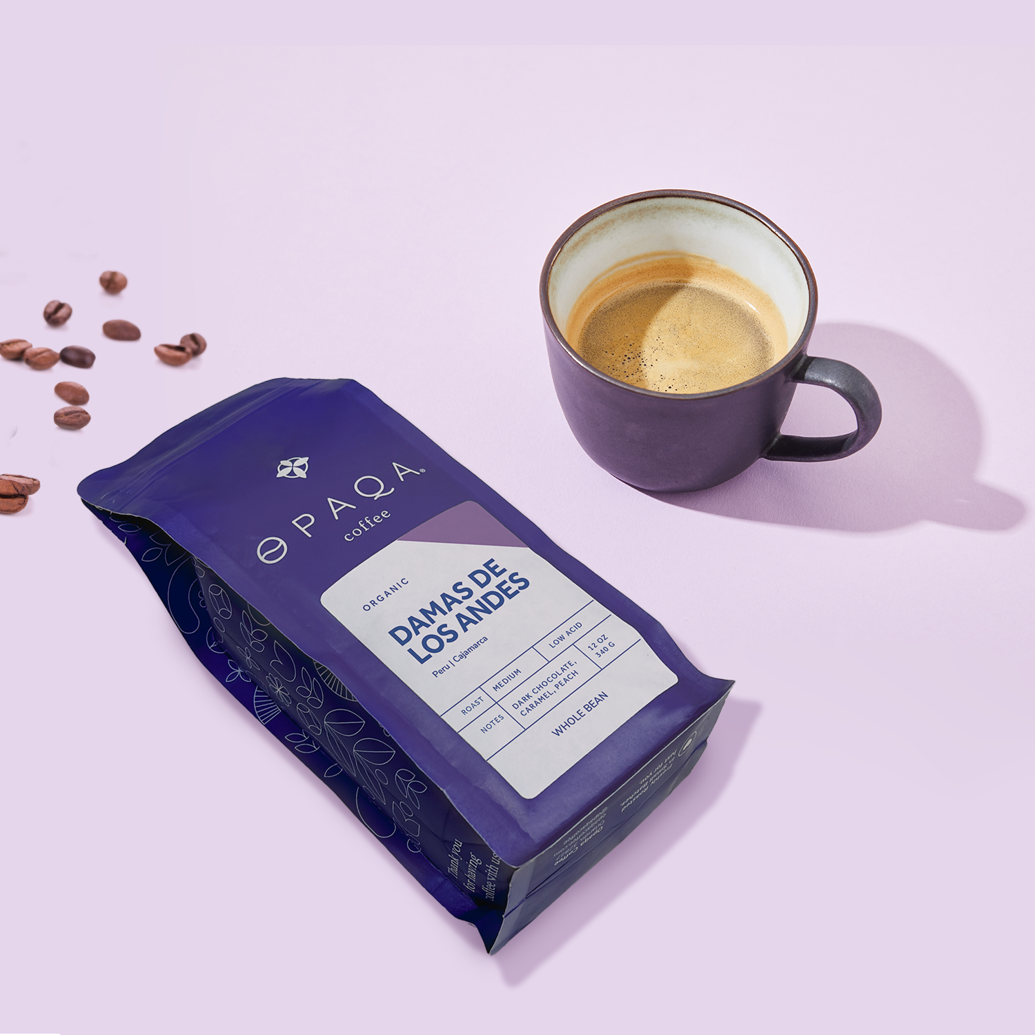 PAQA coffee package with a cup of coffee on a light purple background