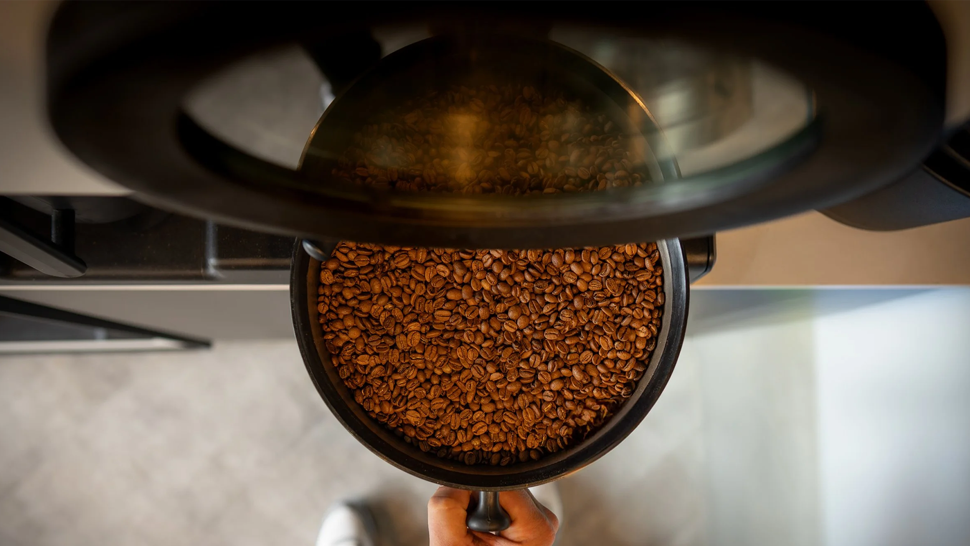 Coffee grinder with freshly ground coffee beans