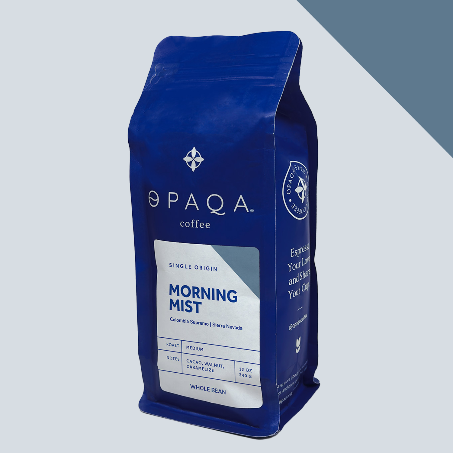 Blue coffee bag labeled 'Opaqa Coffee' on a light gray background