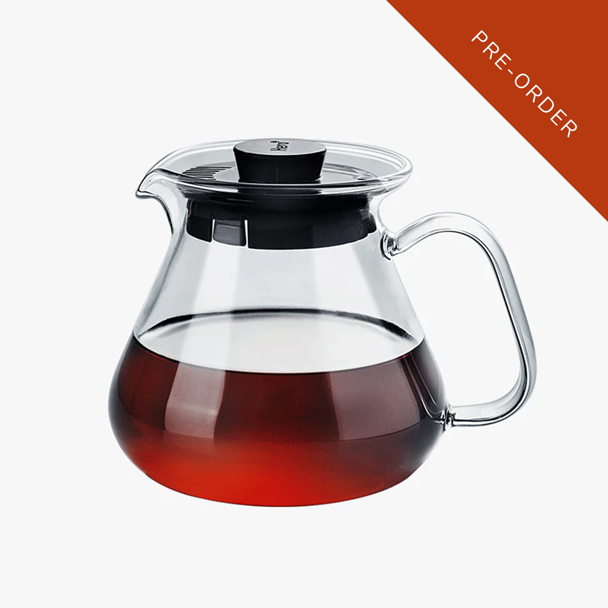 Clear glass teapot with black lid and handle, filled with tea, on a white background with 'PRE-ORDER' text.